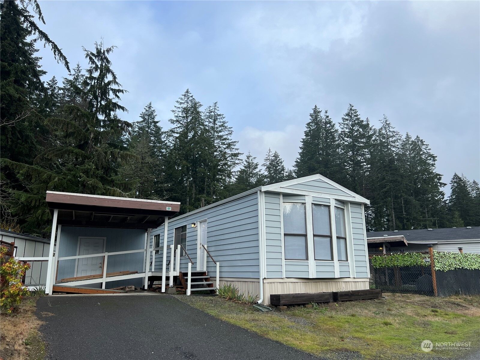 Property Photo: 9111 66th Ave NW 105 WA 98332