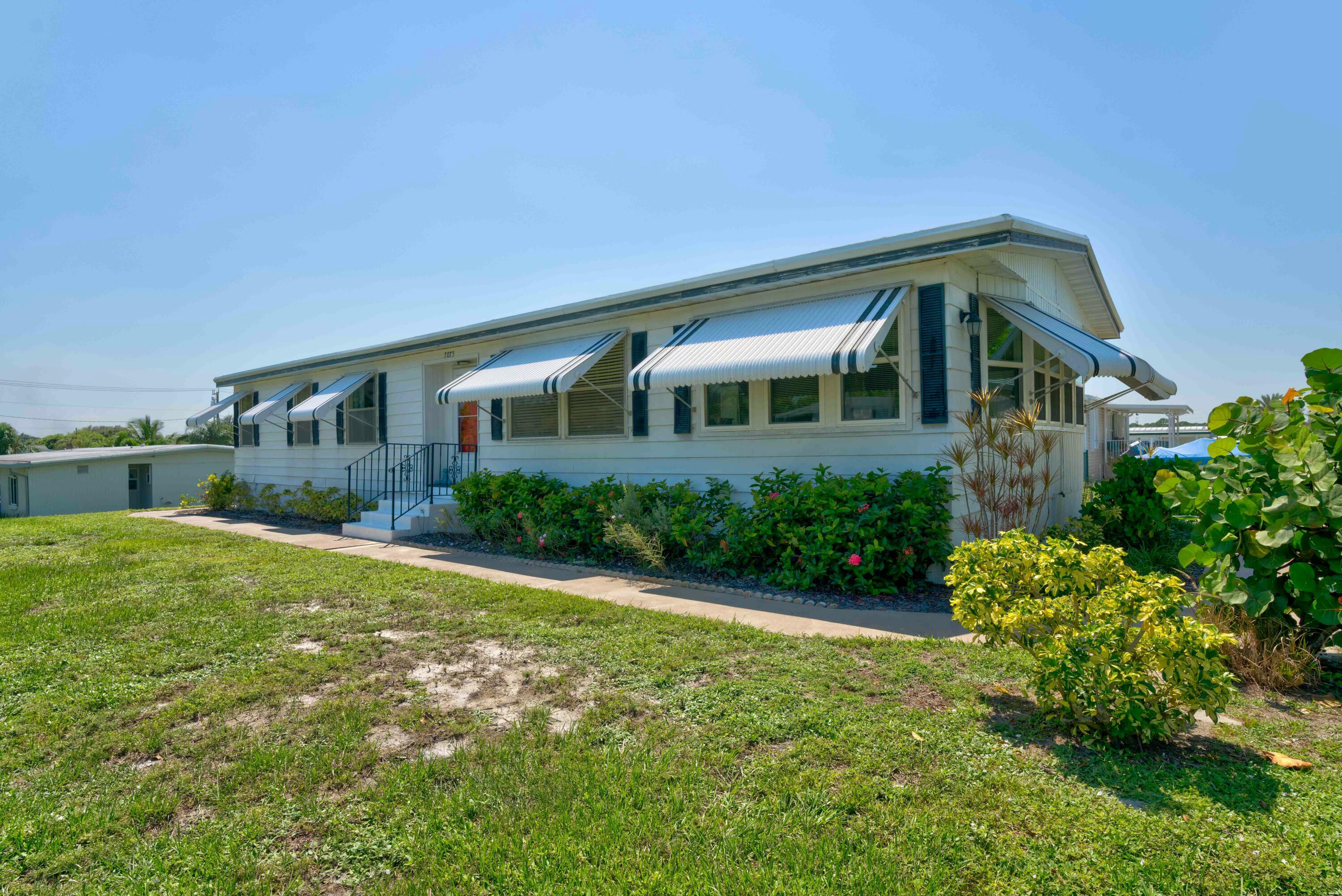 Property Photo:  7075 SE Bluebird Circle  FL 33455 