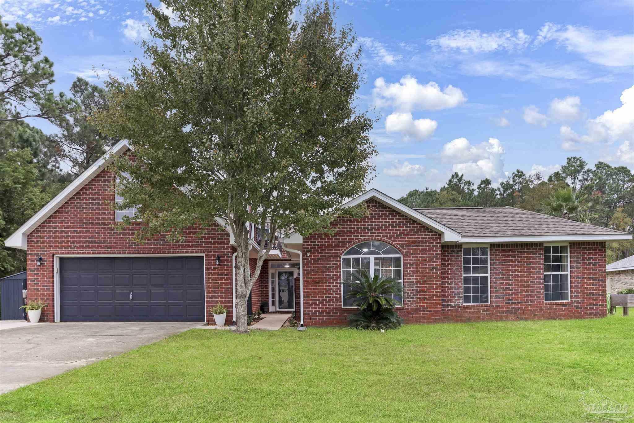 Property Photo:  5669 Als Way  FL 32583 