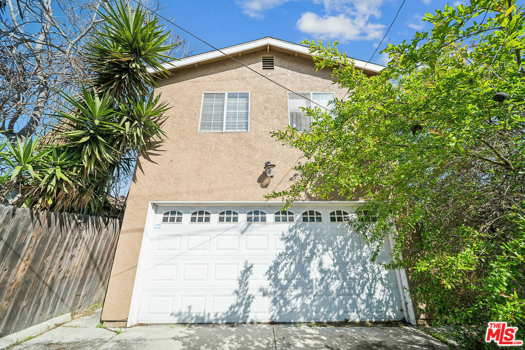 Property Photo:  12221   Athens Way  CA 90061 