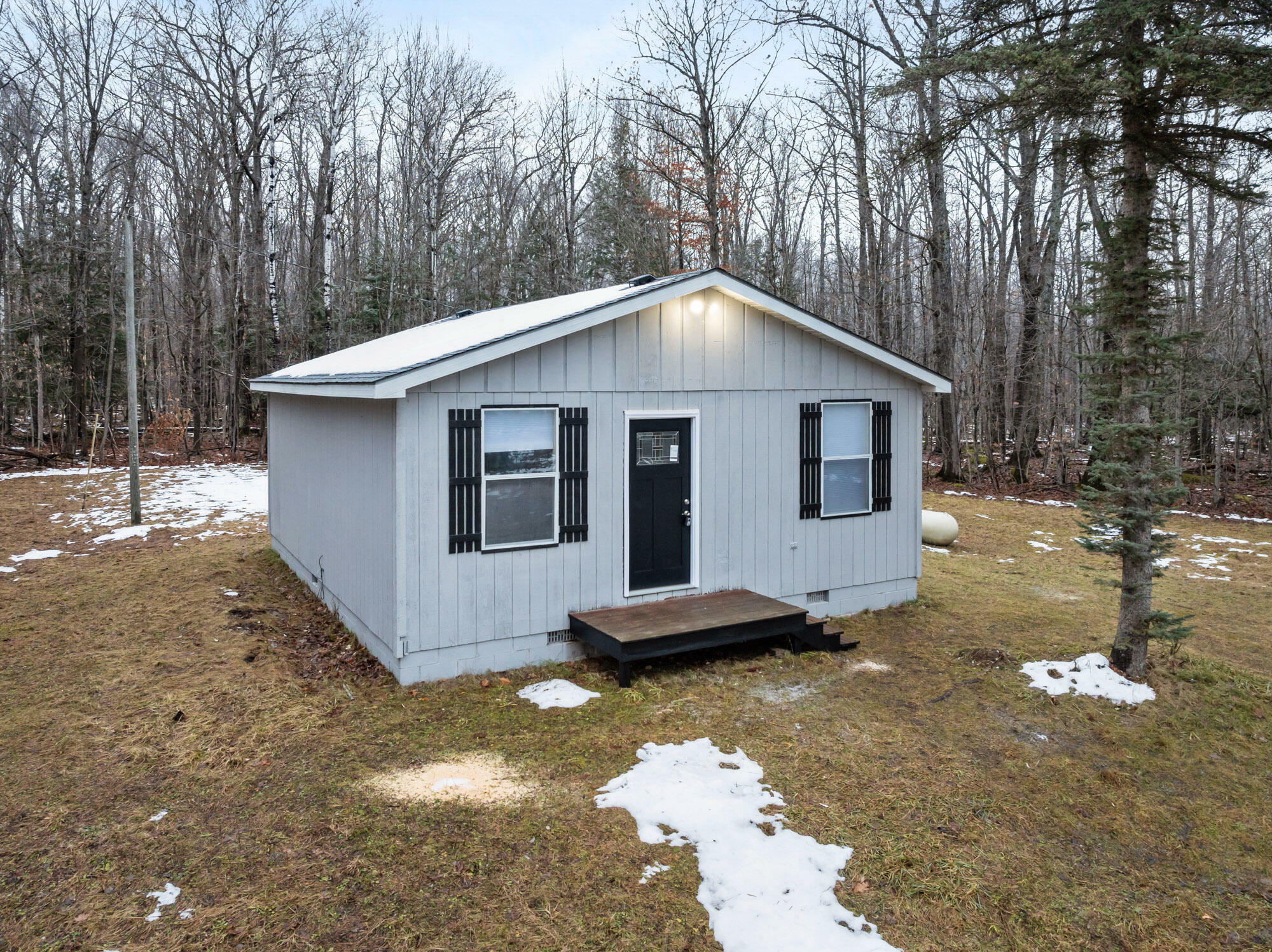 Property Photo:  4280 Woodmansee Road  MI 49721 