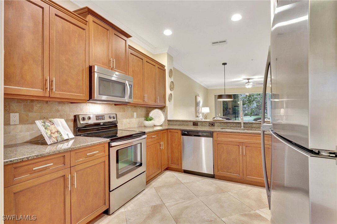 Property Photo:  965 Tarpon Cove Drive 103  FL 34110 