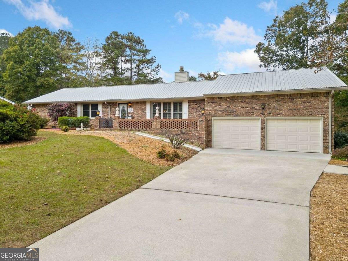 Property Photo:  7312 Melrose Court  GA 30180 