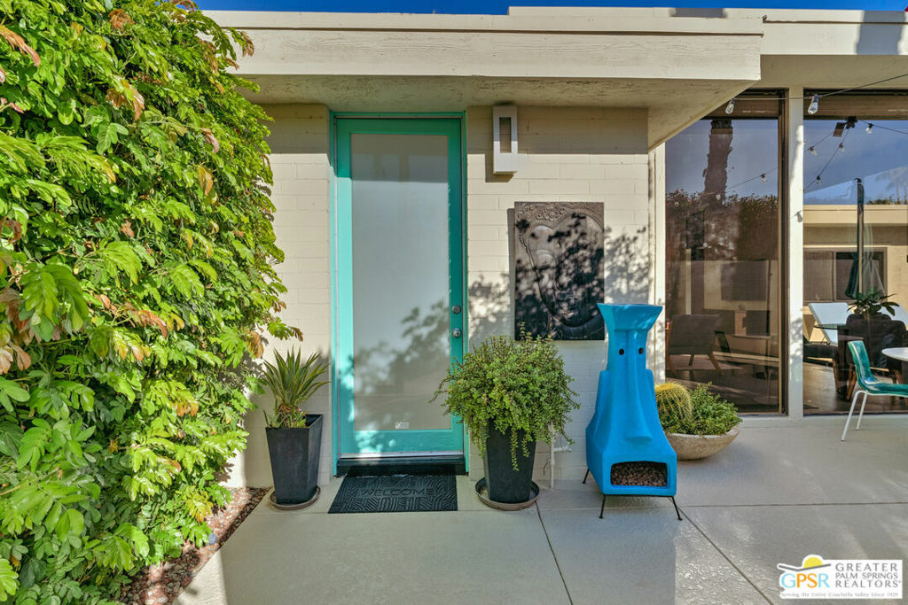 Property Photo:  130 W Racquet Club Road 401  CA 92262 