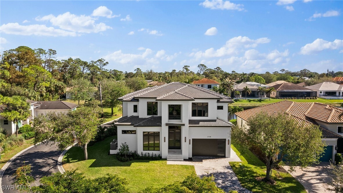 Property Photo: 27148 Serrano Way FL 34135