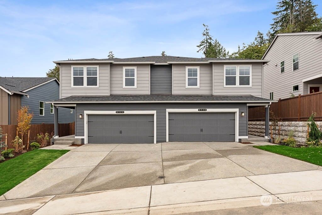 Property Photo:  6818  Langley Avenue NE 122  WA 98311 