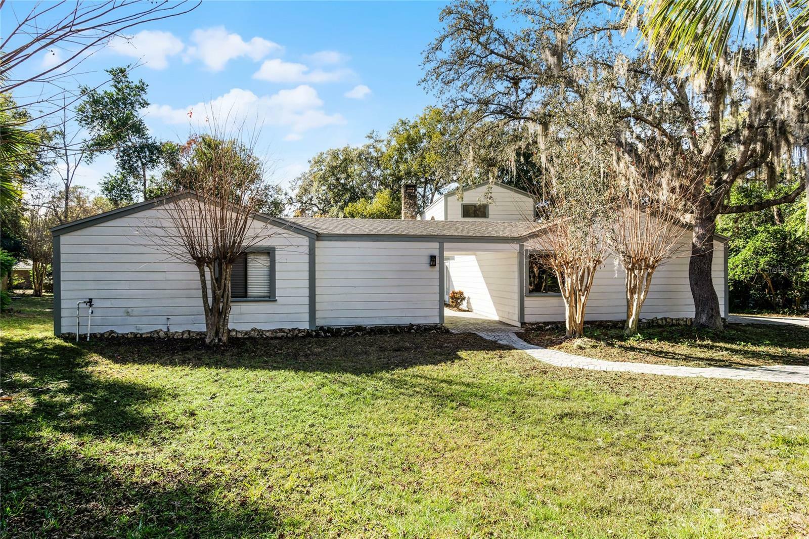 Property Photo: 203 Red Bud Lane FL 32779
