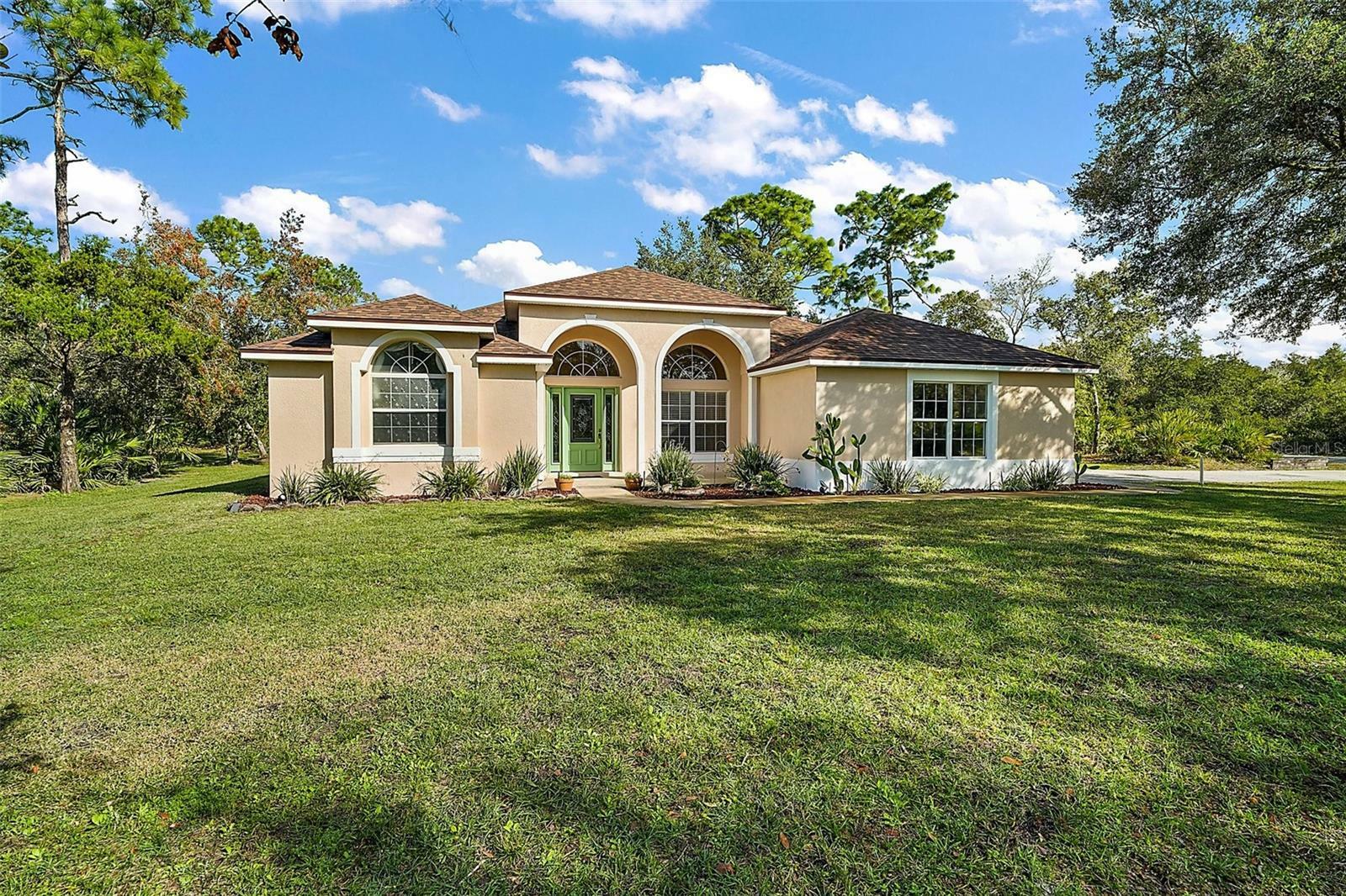 Property Photo:  42714 Royal Trails Road  FL 32736 