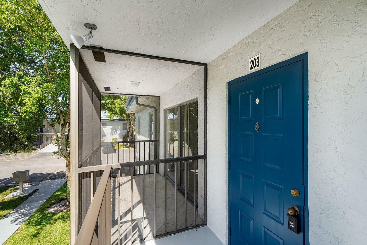 Property Photo: 7511 S Oriole Boulevard 203 FL 33446