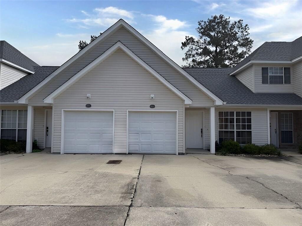 Property Photo: 103 Covington Meadow Circle G LA 70433