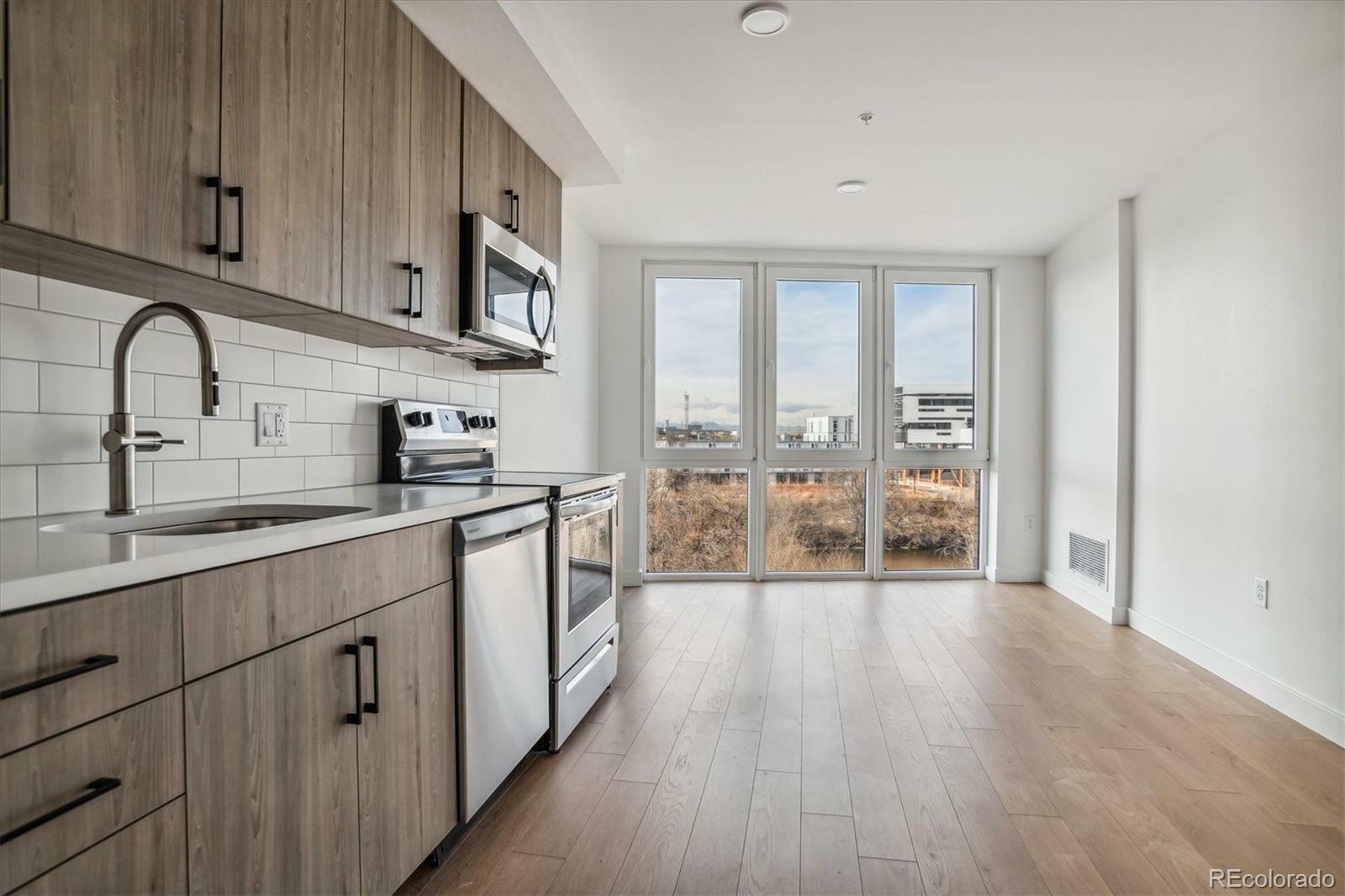 Property Photo: 3575 Chestnut Place 406 CO 80216