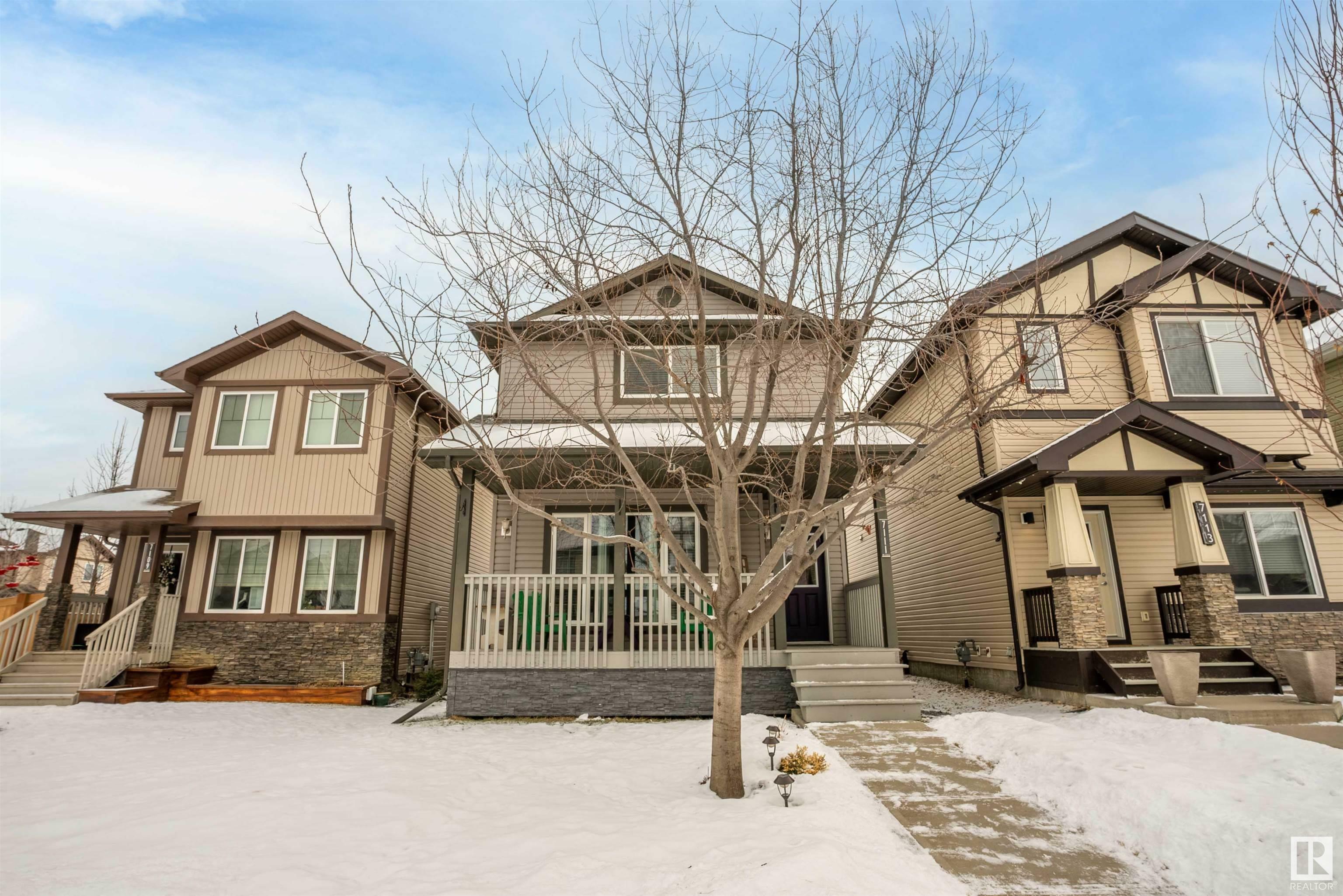 Property Photo:  7111 Cardinal Way SW  AB T6W 1Z3 