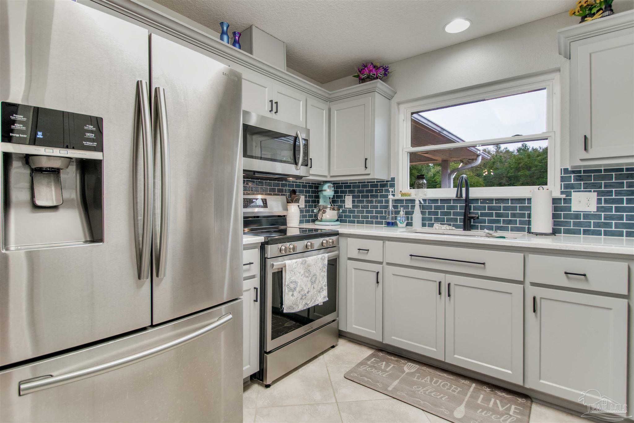 Property Photo:  6895 Beaudry Ln  FL 32570 