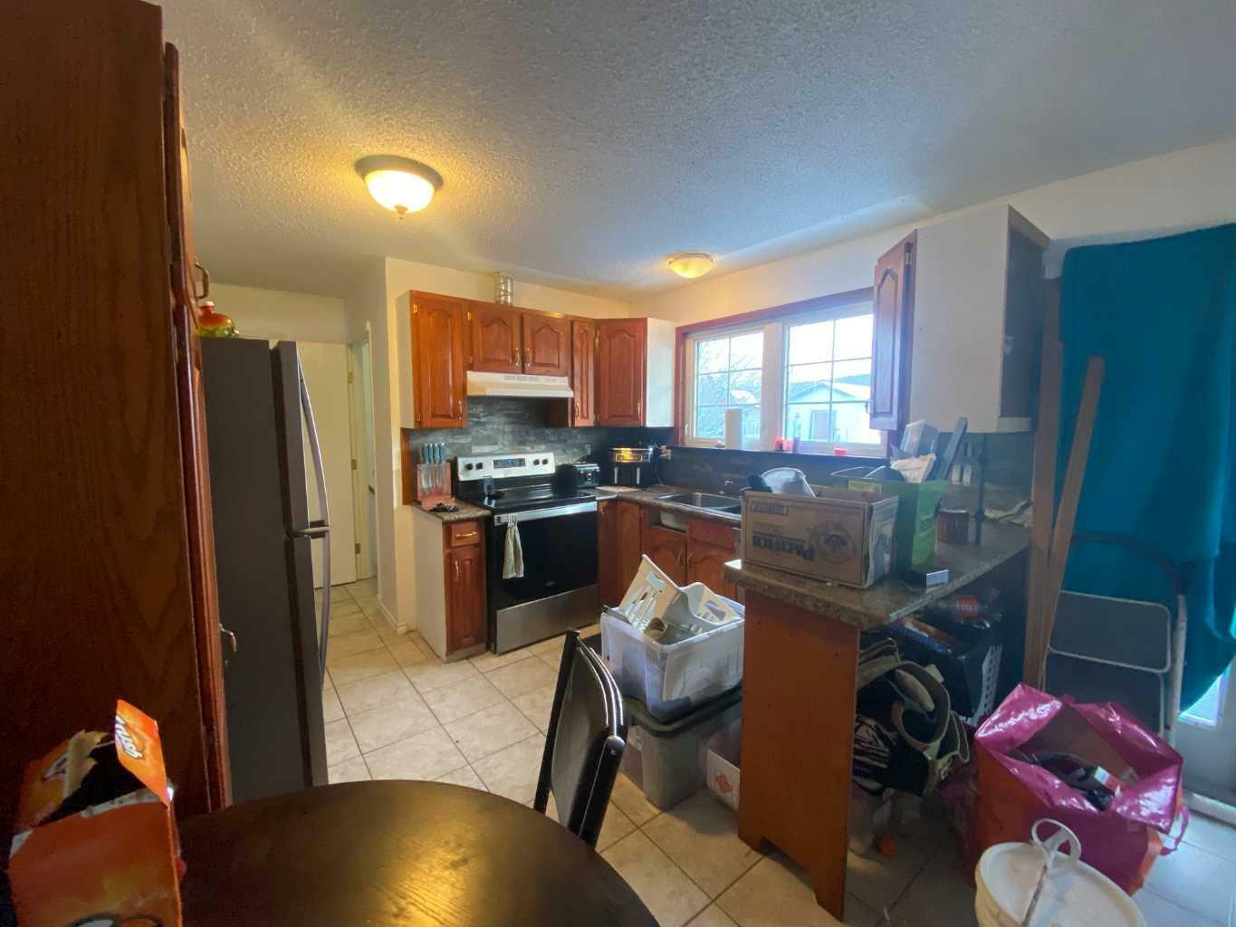 Property Photo:  449 Mountain Street  AB T7V 1K1 