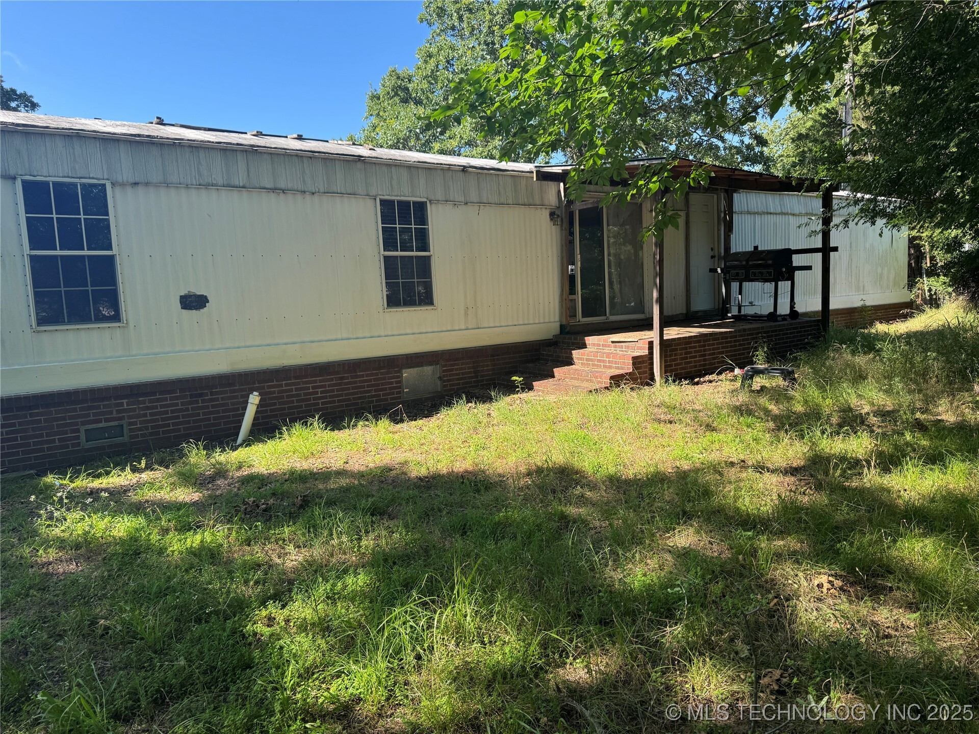 Property Photo: 6935 W 67th Street OK 74126