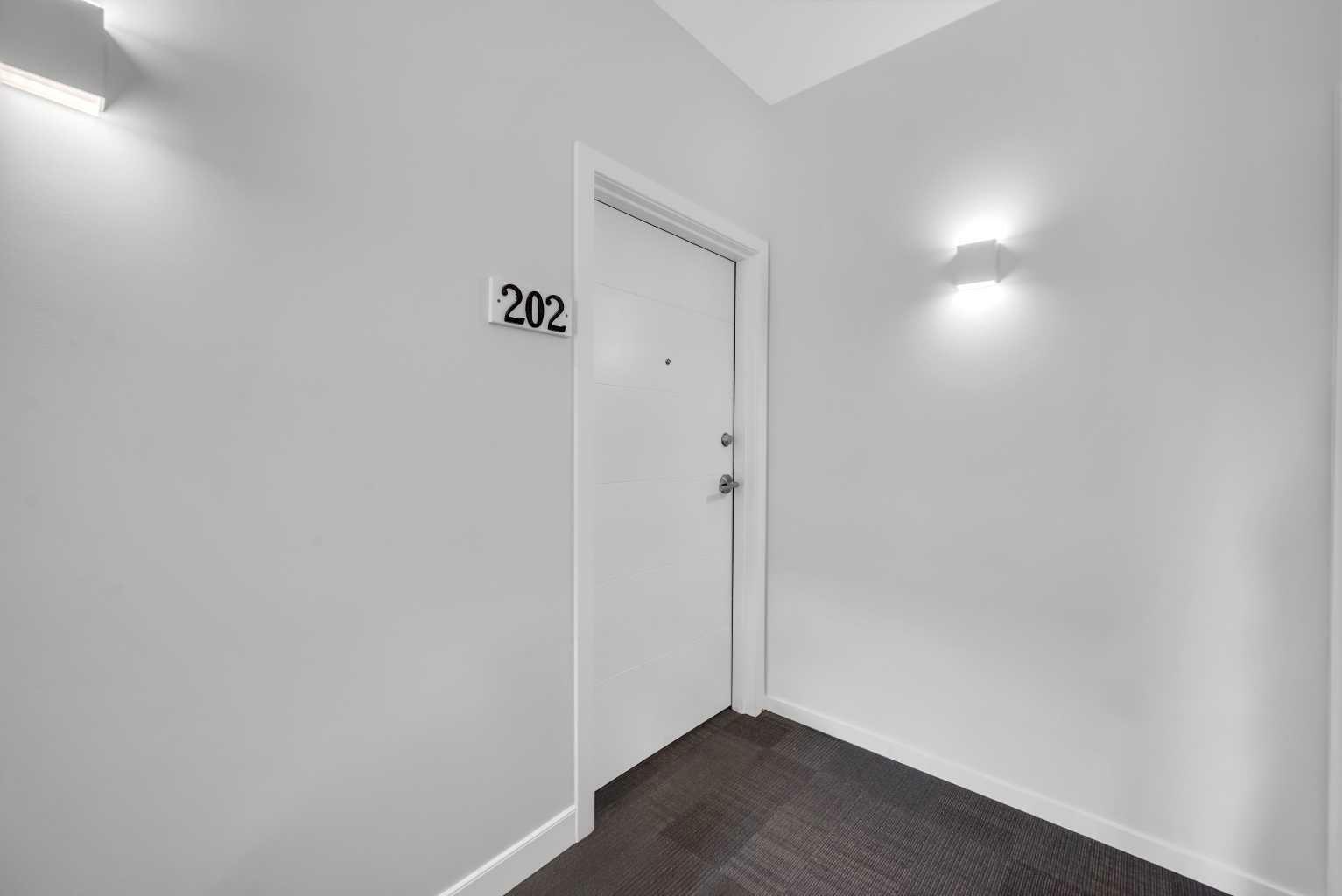 Property Photo:  140 Redstone  NE 202  AB T3N 1M6 