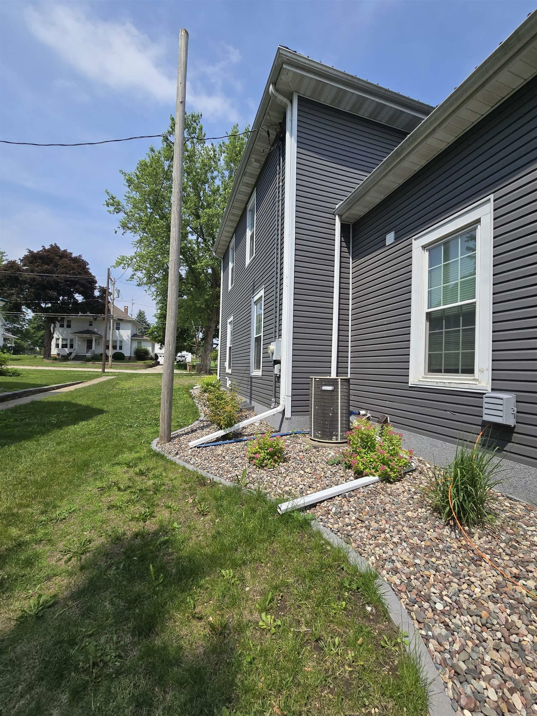 Property Photo: 208 W Spring Street IA 52076