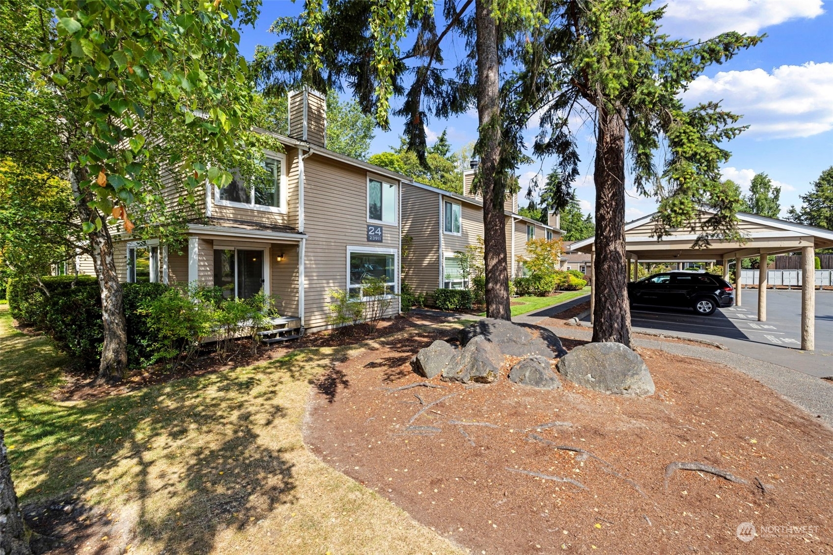 Property Photo: 23911 12th Place S 2405 WA 98198