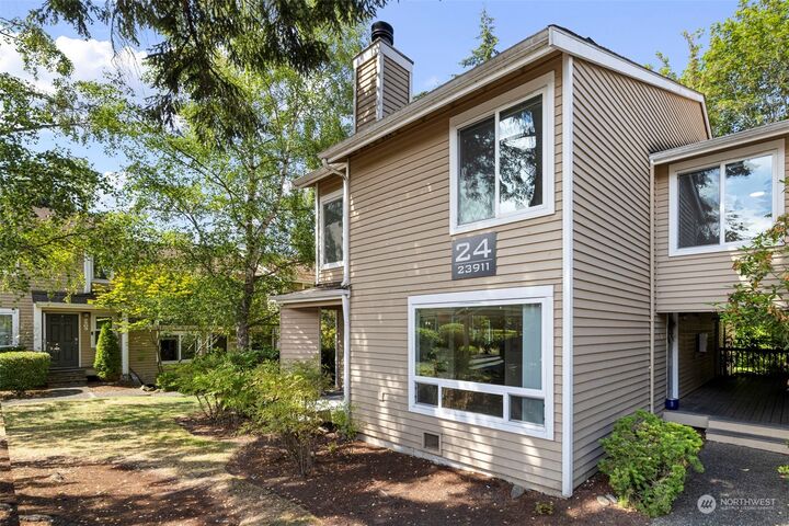 Property Photo:  23911  12th Place S 2405  WA 98198 