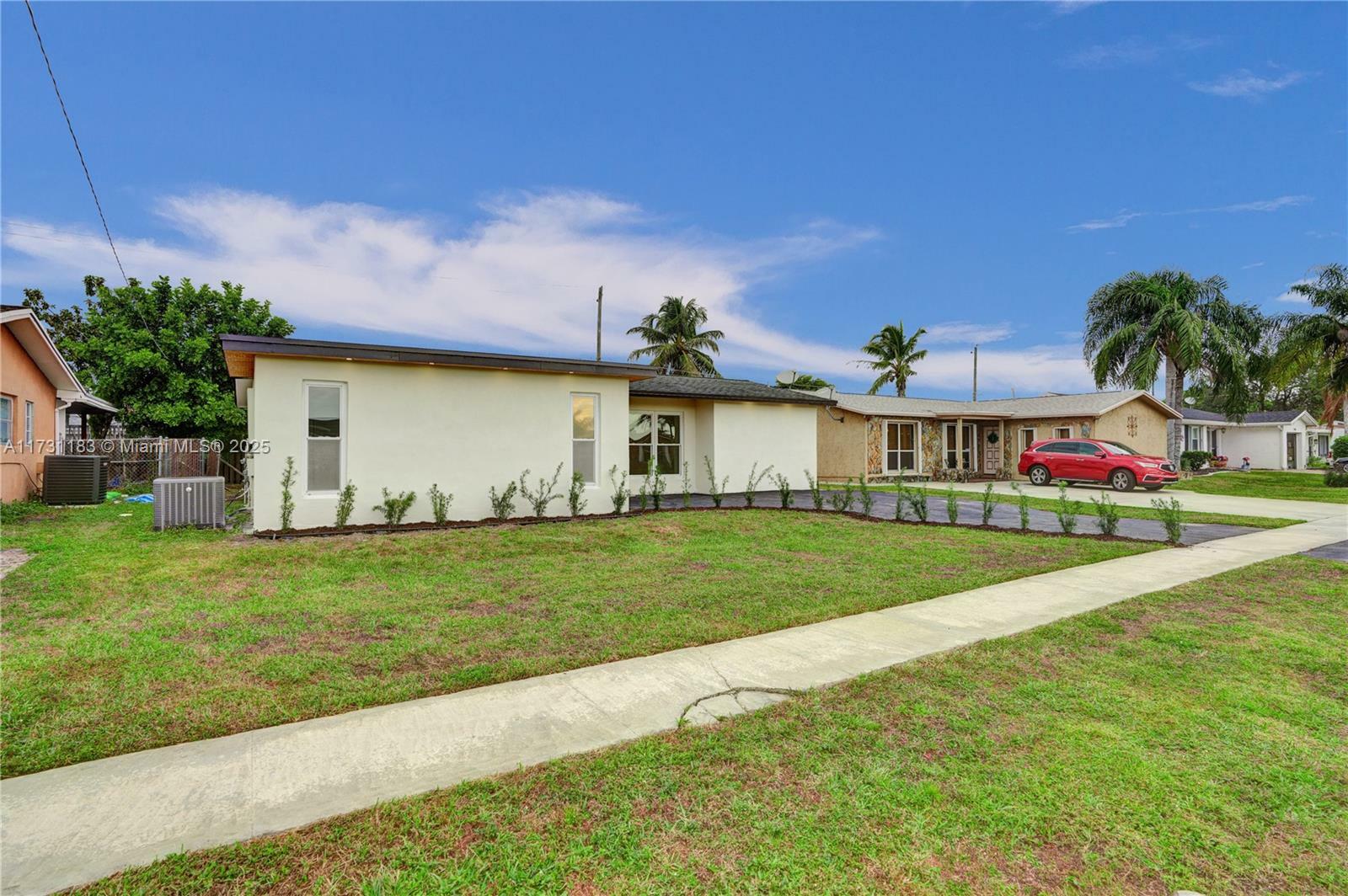 Property Photo:  11711 NW 32nd Mnr  FL 33323 