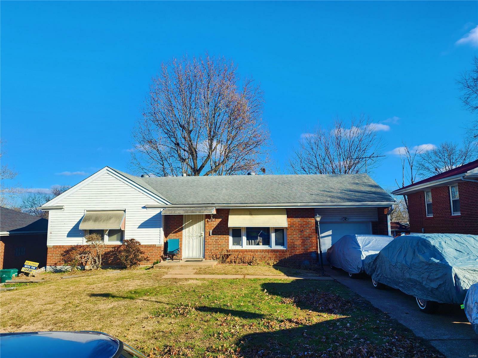 Property Photo:  9236 Filibert Drive  MO 63137 