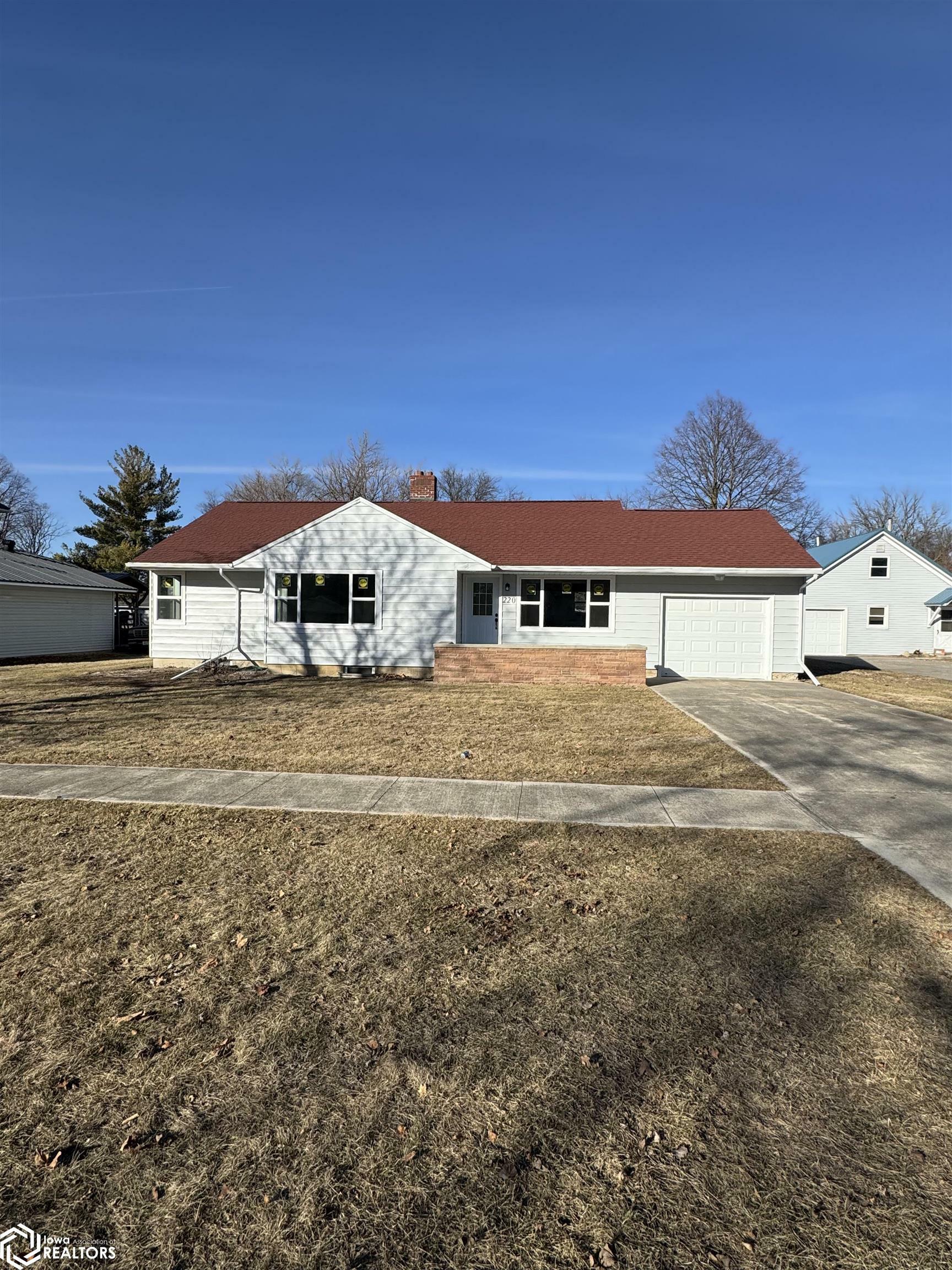 Property Photo:  220 W Maple Street  IA 50122 