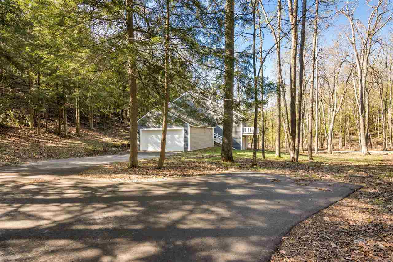 Property Photo:  1458 Timber Pass  MI 49740 