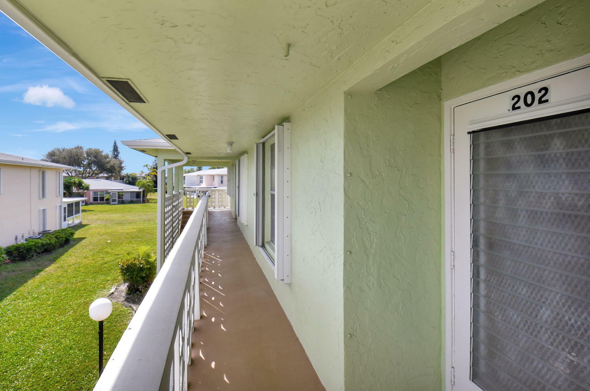 Property Photo:  1670 NW 18th Avenue 202  FL 33445 