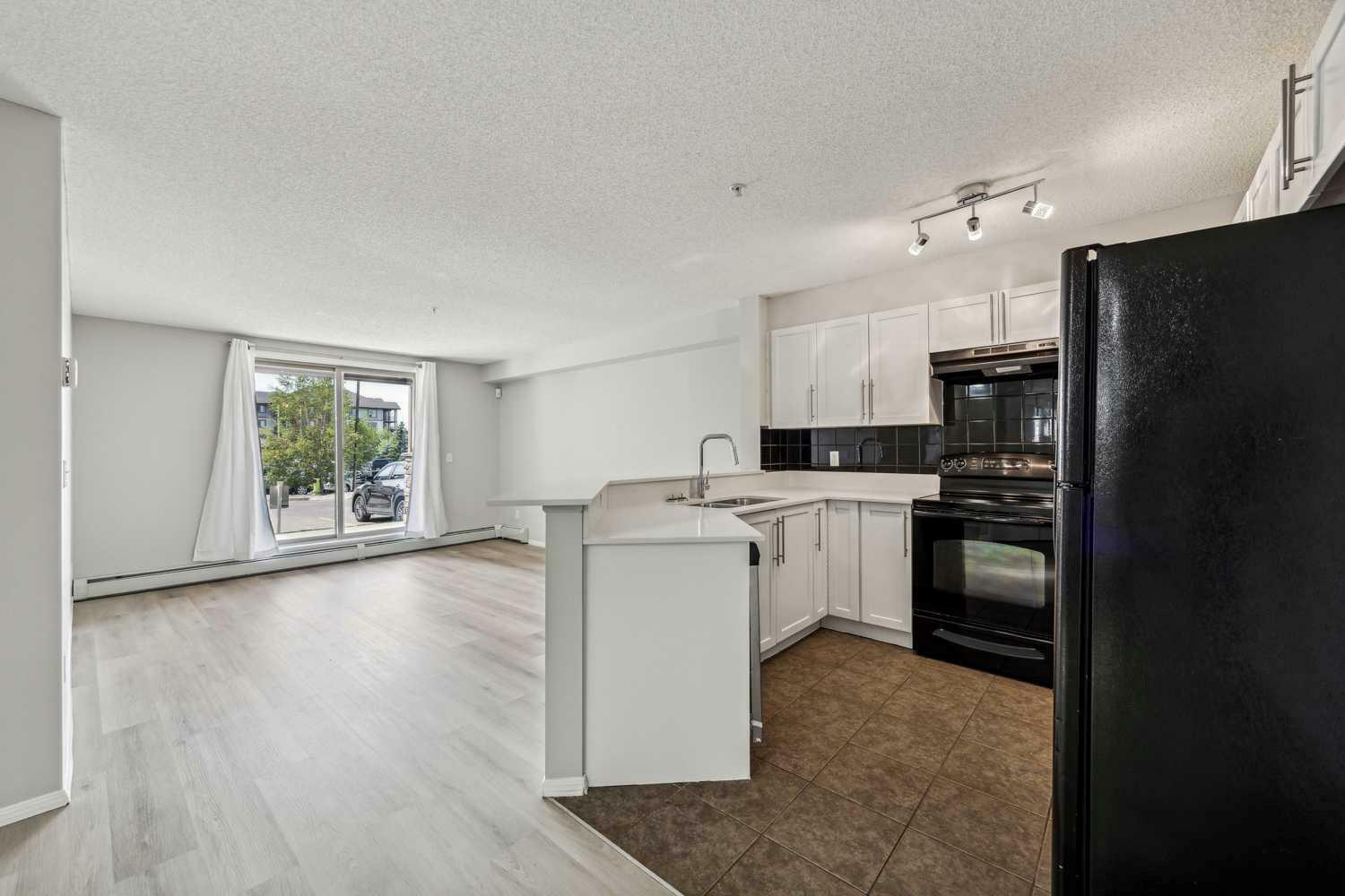 Property Photo:  60 Panatella Street NW 1109  AB T3K 0M4 