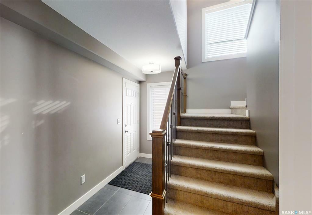 Property Photo:  1033 Kolynchuk Crescent  SK S7T 0X4 