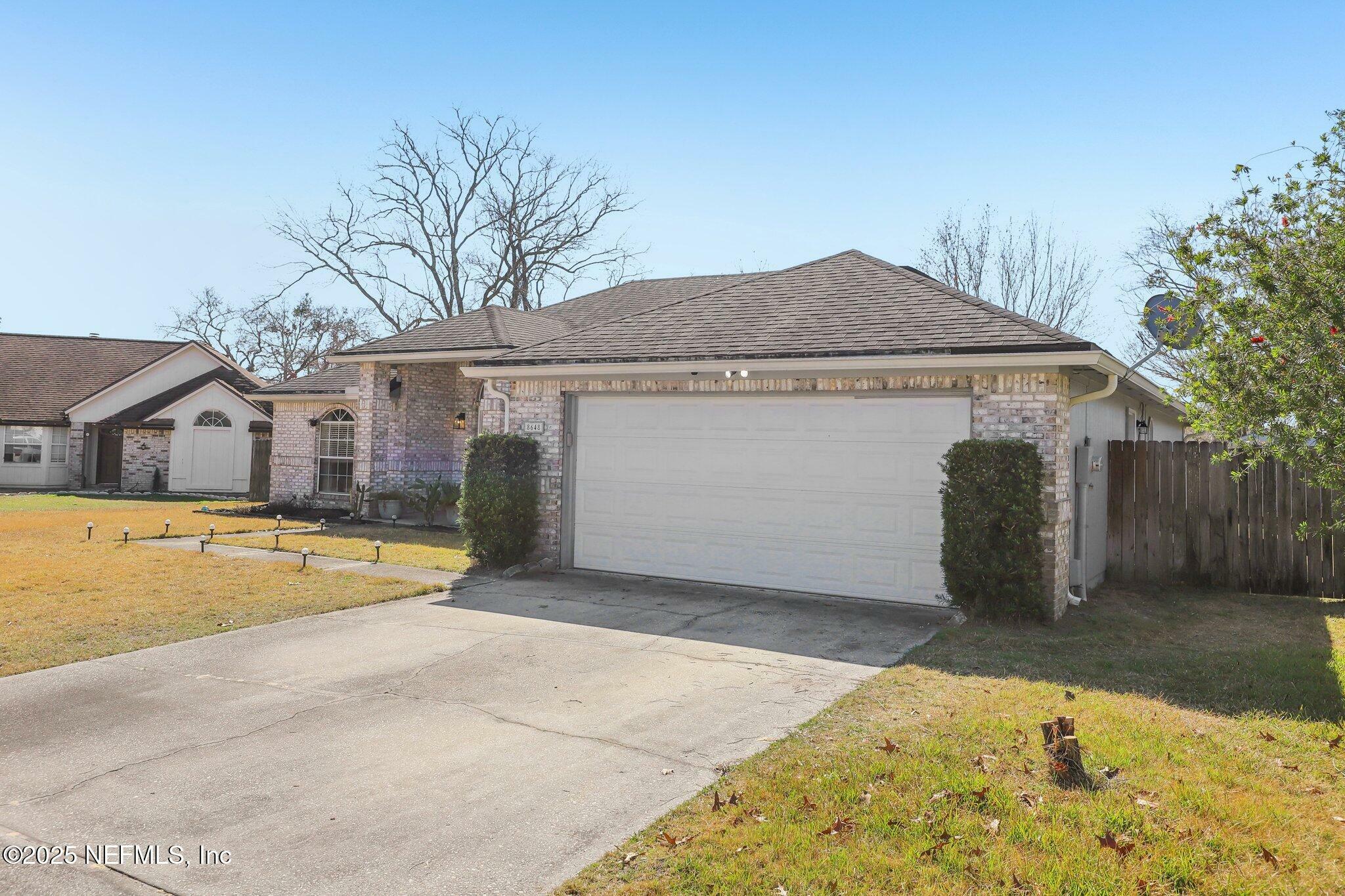 Property Photo:  8648 Dellbridge Court  FL 32244 