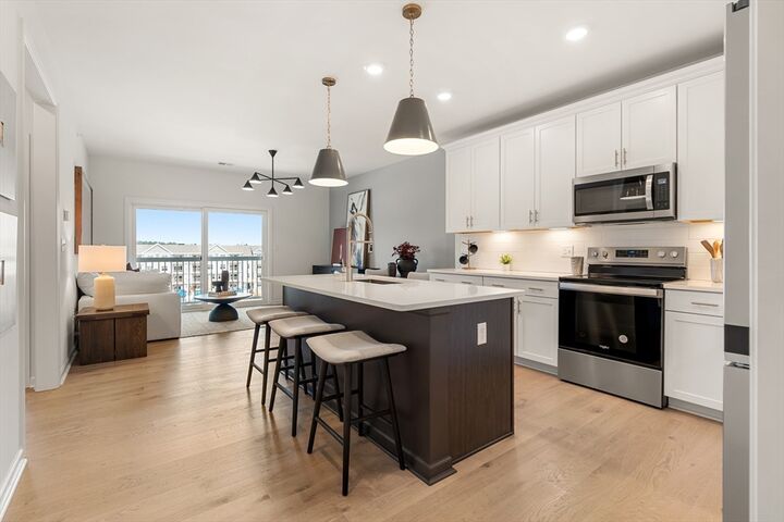 Property Photo:  2 Codman Way 103  MA 01581 