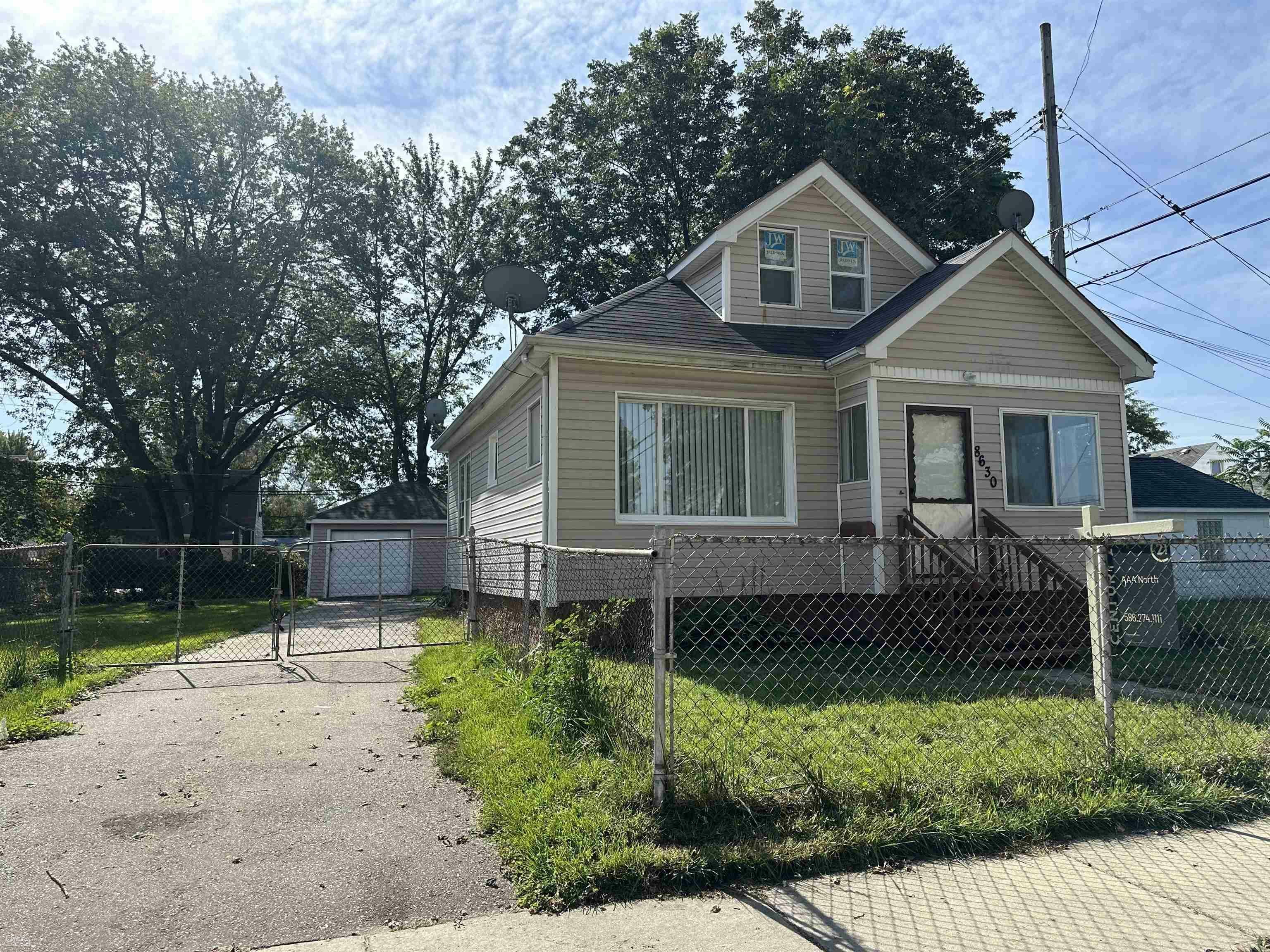 Property Photo:  8630 Hupp Avenue  MI 48089 