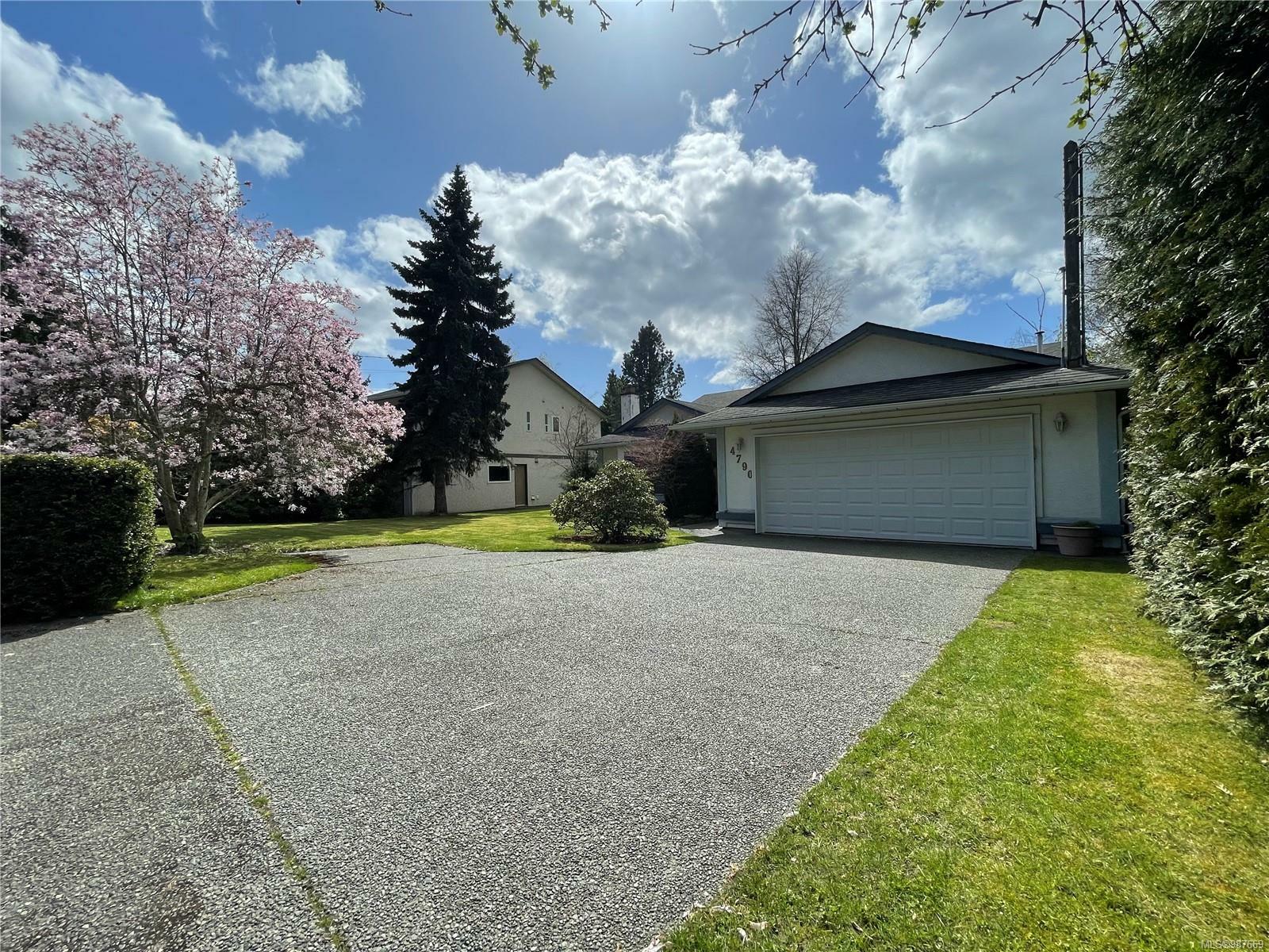 Property Photo: 4790 Cordova Bay Rd BC V8Y 2J5