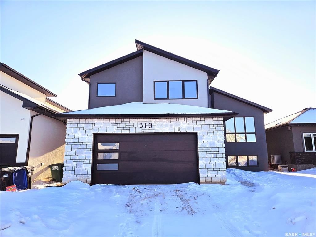 Property Photo:  310 Flynn Manor  SK S7V 0Z4 