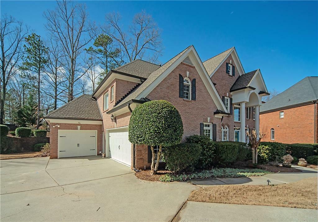 Property Photo: 6195 Mountainwell Drive GA 30075