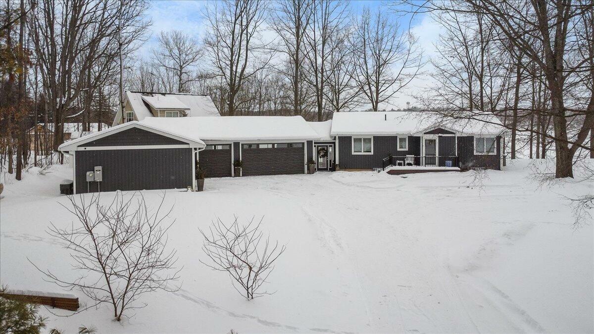 Property Photo:  9356 Miramichi Drive  MI 49631 