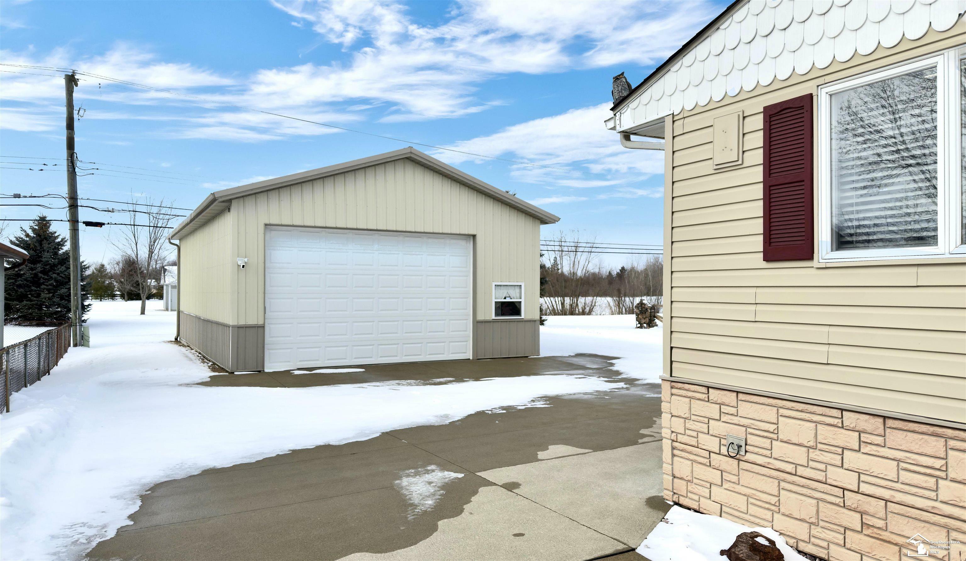 Property Photo:  818 S Raisinville Road  MI 48161 