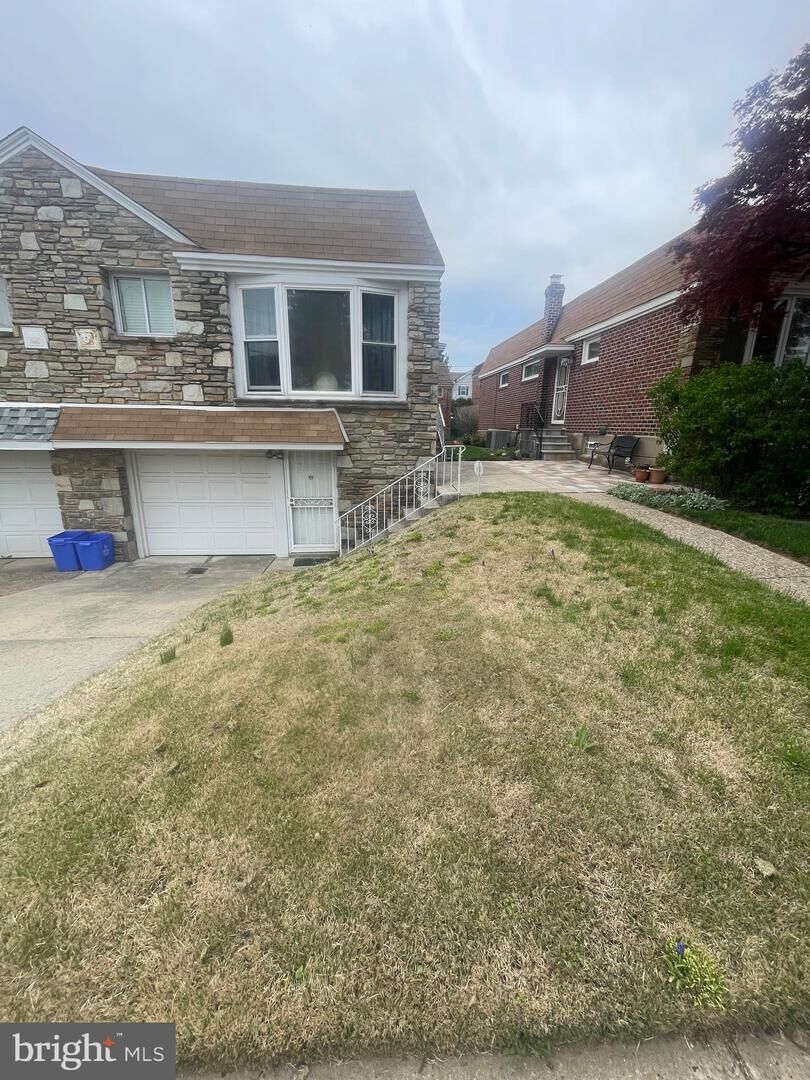 Property Photo:  1003 E Sedgwick Street  PA 19150 