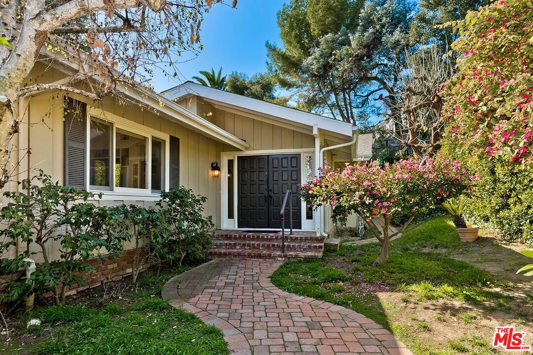 Property Photo:  751   Teakwood Rd  CA 90049 