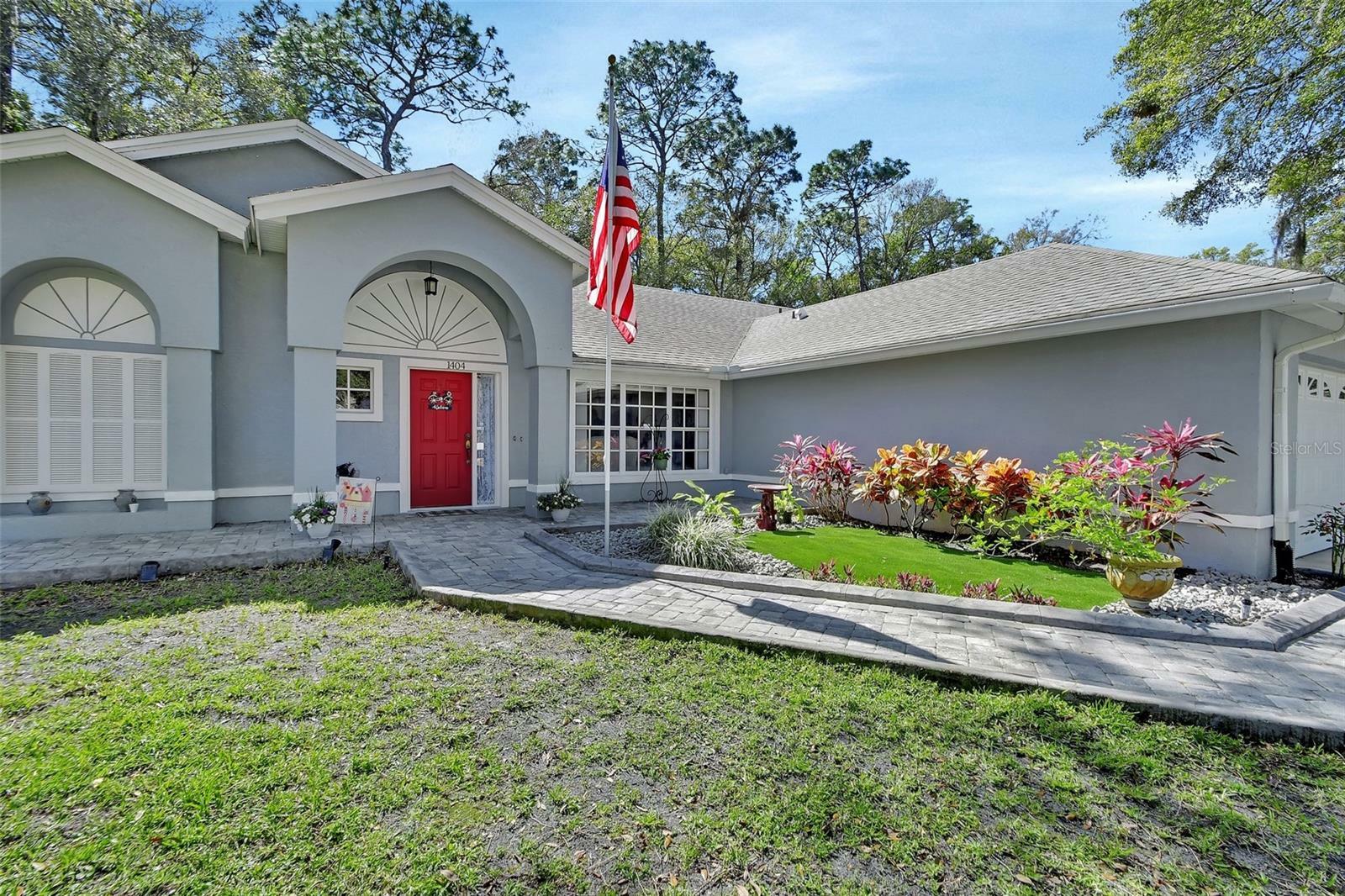 Property Photo:  1404 Whispering Woods Way  FL 32724 