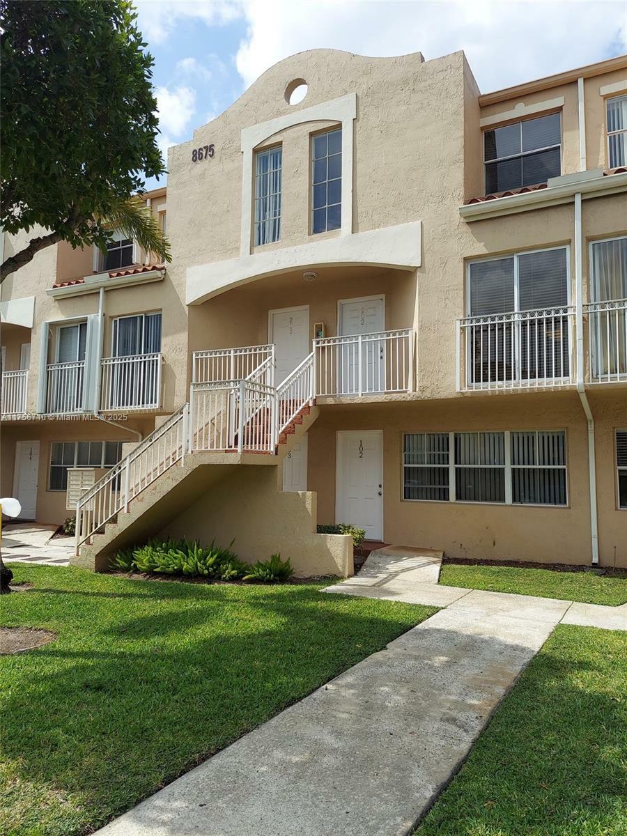 Property Photo:  8675 NW 5th Ter 13-203  FL 33126 