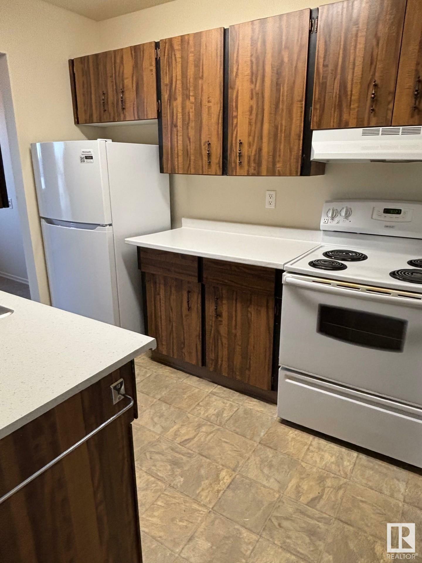 Property Photo: 18204 93 Avenue NW 309 AB T5T 2V2