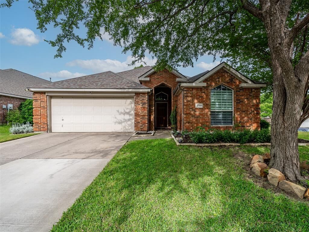 Property Photo:  2709 Travis Drive  TX 75072 