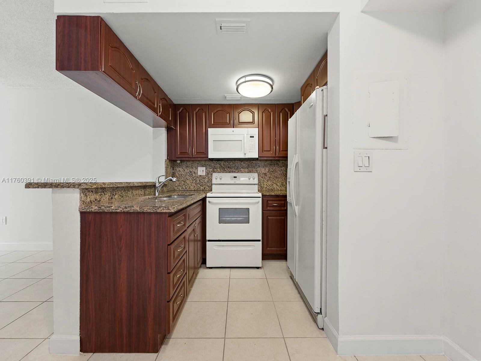Property Photo: 8585 NW 6th Ln 9-208 FL 33126