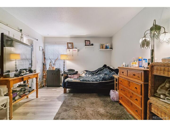 Property Photo:  3320 S Ammons St 104  CO 80227 