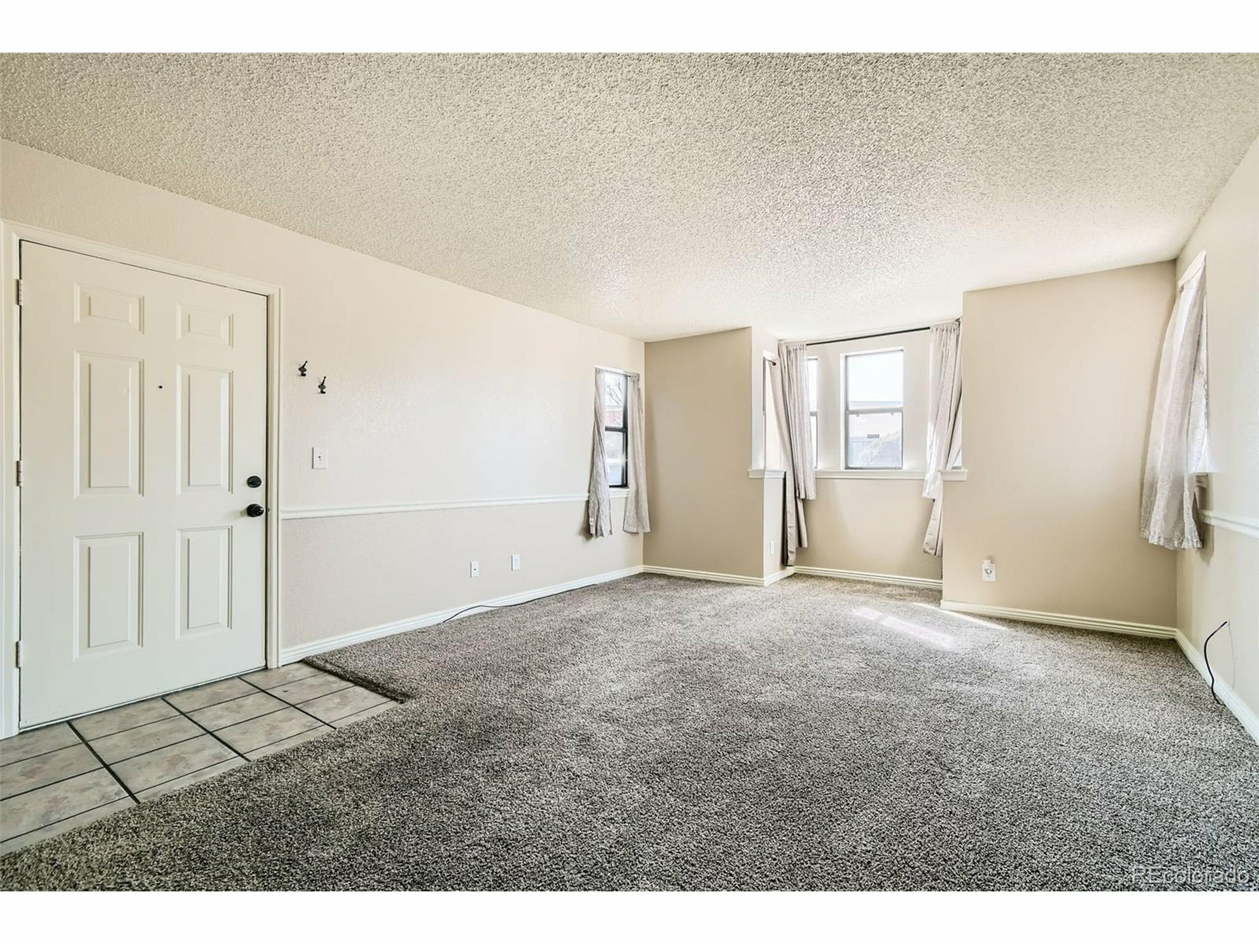 Property Photo: 8770 Corona St 102 CO 80229