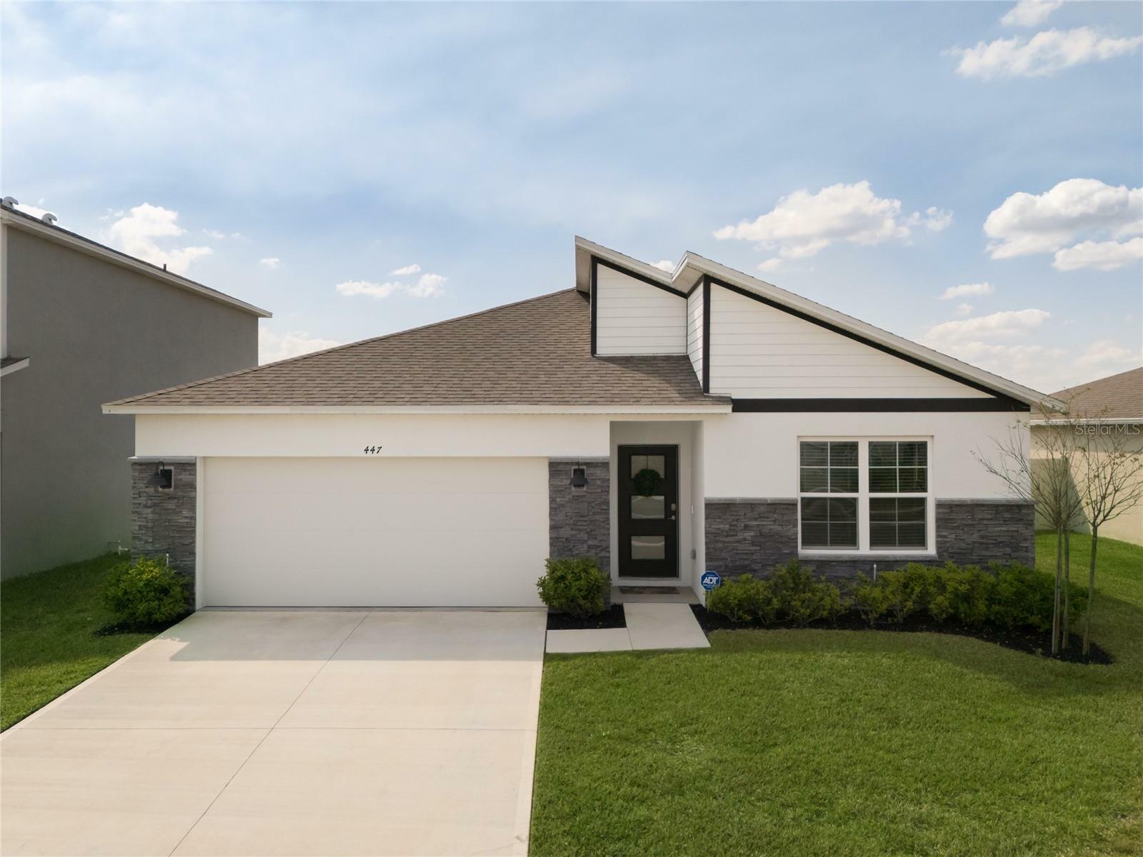 Property Photo:  447 Talisi Loop  FL 34771 