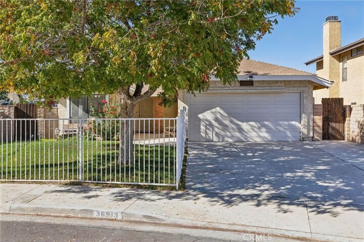 Property Photo: 36913 Tobira Drive CA 93550