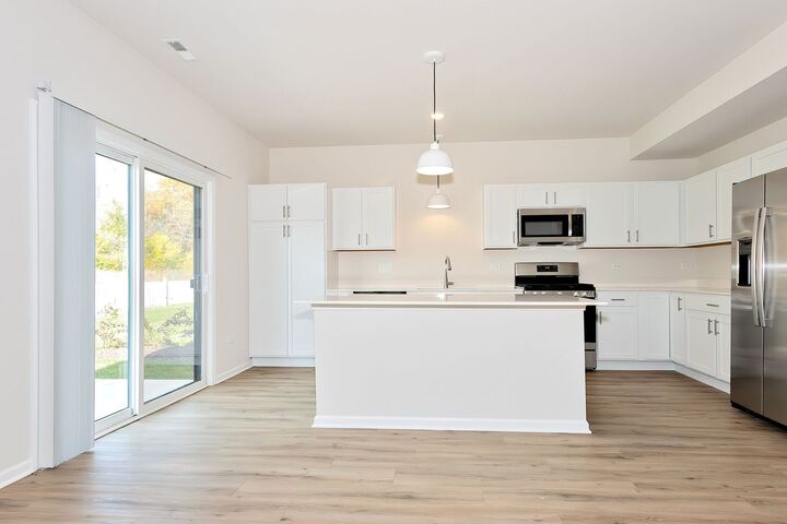 Property Photo:  1010 Bristol Court  IL 60136 